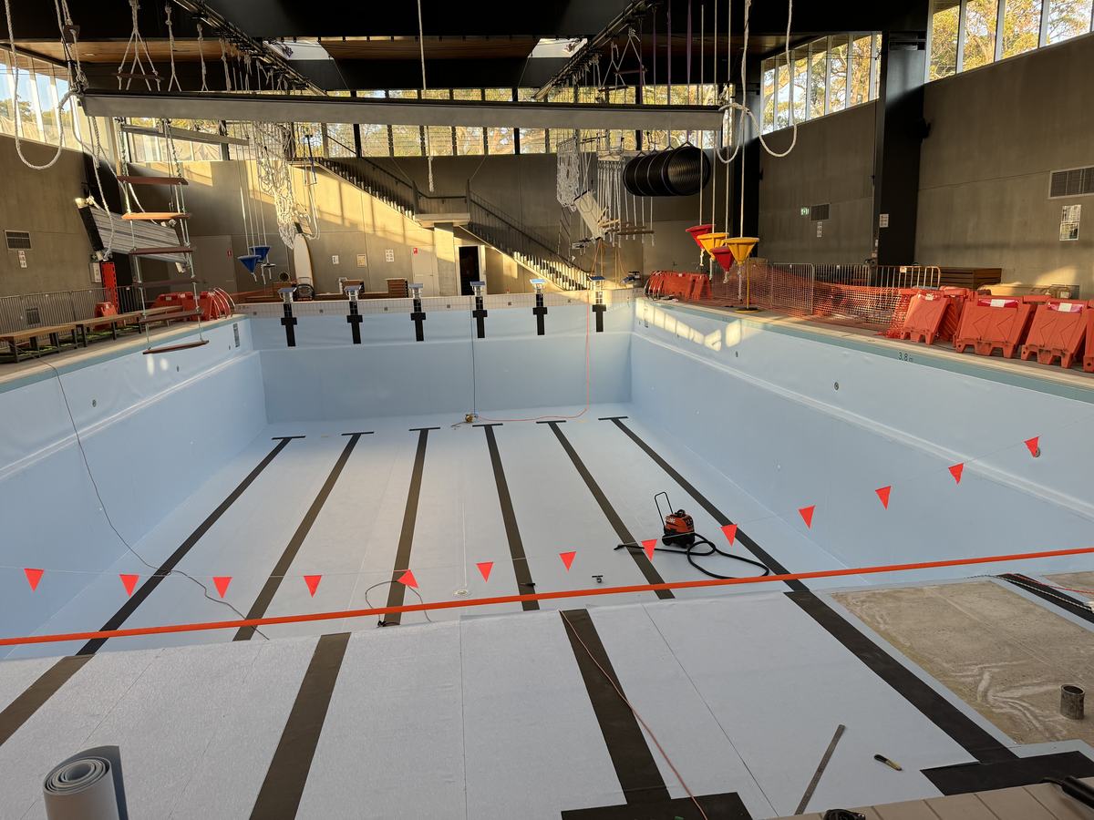 Indoor pool with new lane markings and wall targets